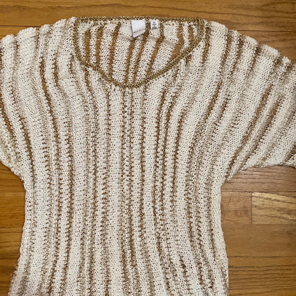 White and gold see through top